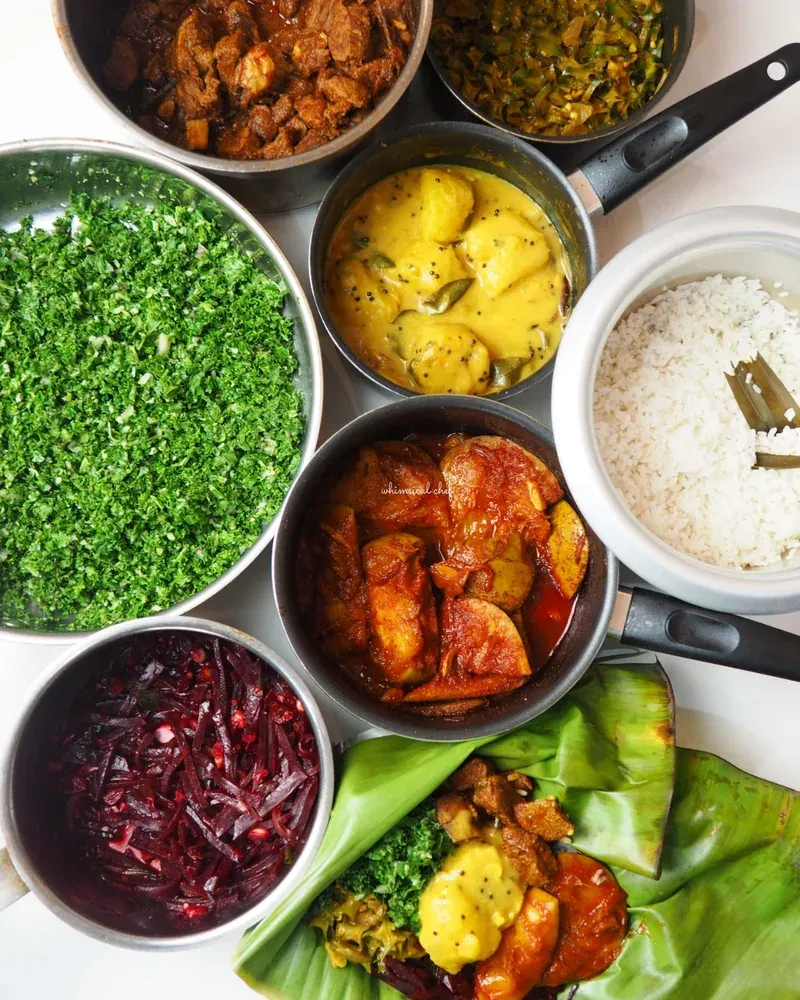 Sri Lankan rice surrounded by colorful curries